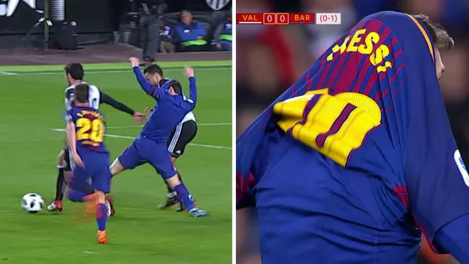Messi bị sao Valencia kéo áo trùm đầu - Bóng Đá