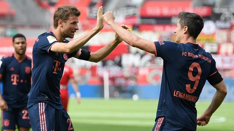 Muller hit milestones as Bayern ease past Leverkusen - Bóng Đá