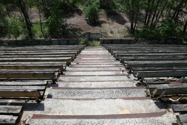 RADIOACTIVE RUINS Inside abandoned football stadium in heart of Chernobyl with forest growing on pitch years after devastating disaster - Bóng Đá