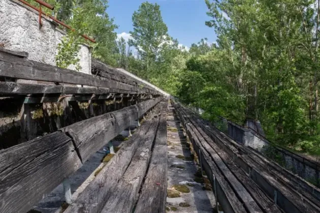 RADIOACTIVE RUINS Inside abandoned football stadium in heart of Chernobyl with forest growing on pitch years after devastating disaster - Bóng Đá