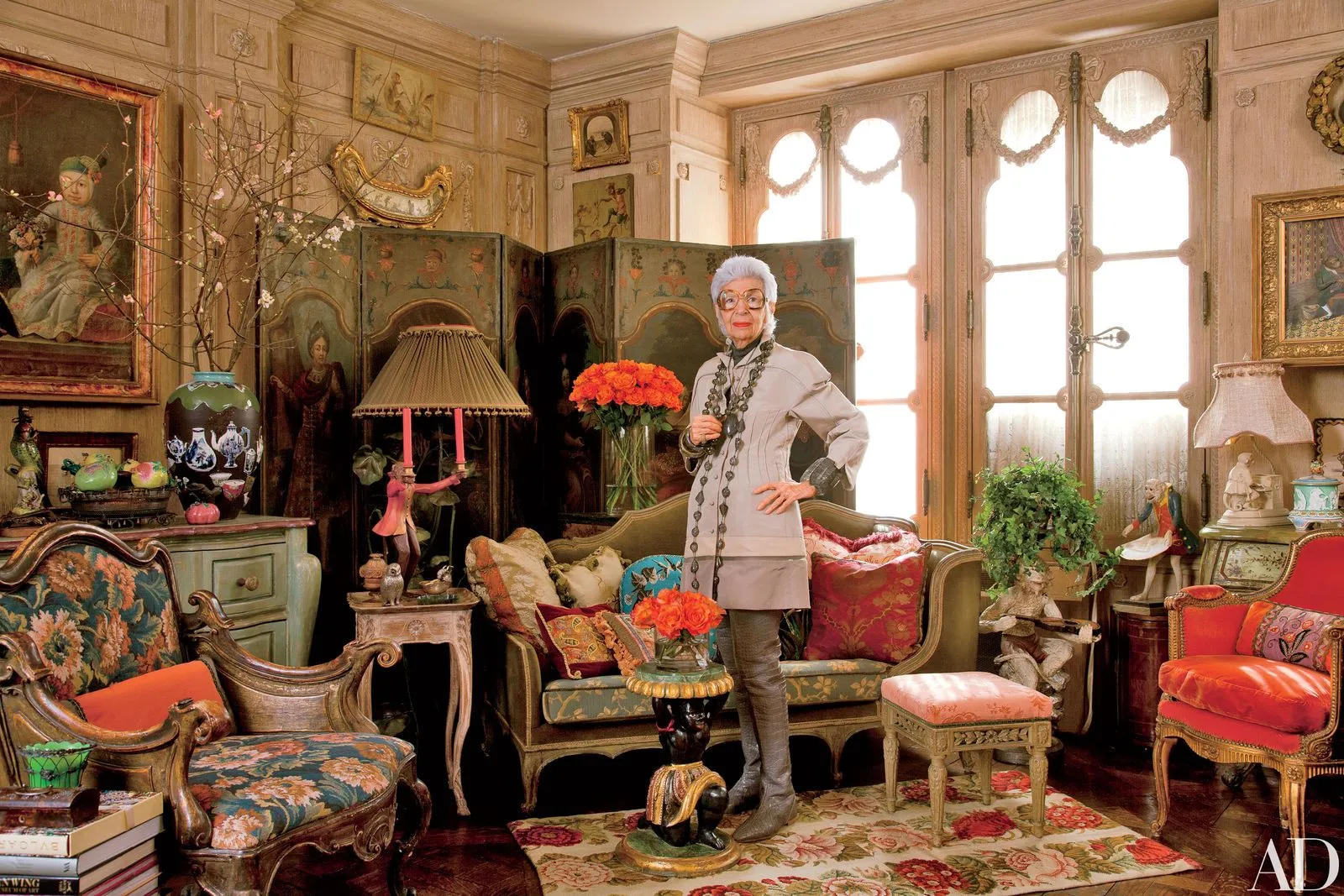 Image may contain Room Living Room Indoors Furniture Couch Human Person and Iris Apfel