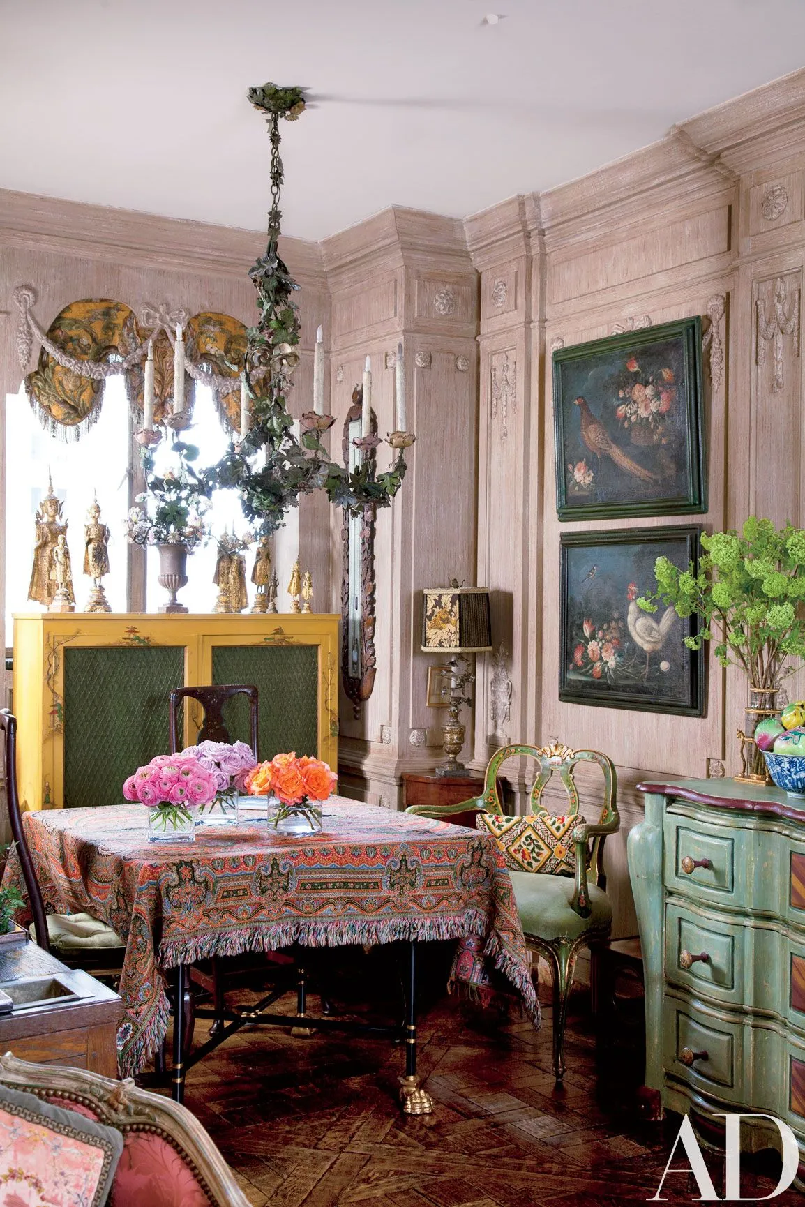 Image may contain Room Living Room Indoors Furniture Chair Home Decor Interior Design Plant Dining Table and Table