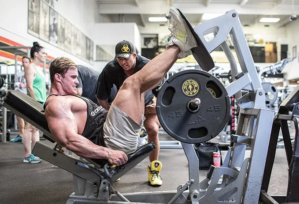 Watch some people do leg presses or hack squats, and you'll see their heels rise from the platform as they reach the bottom of the negative movement.