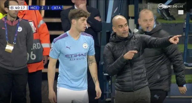 Furious Pep Guardiola shouts at John Stones and slams seat in fit of rage - Bóng Đá