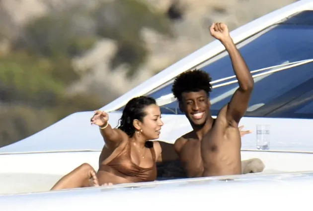 Kingsley Coman straddled by stunning fiancee on boat as Bayern Munich’s Champions League hero relaxes in Sardinia - Bóng Đá