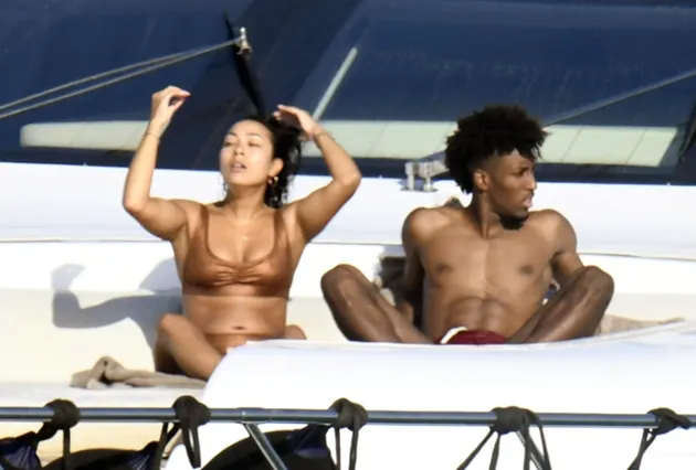 Kingsley Coman straddled by stunning fiancee on boat as Bayern Munich’s Champions League hero relaxes in Sardinia - Bóng Đá