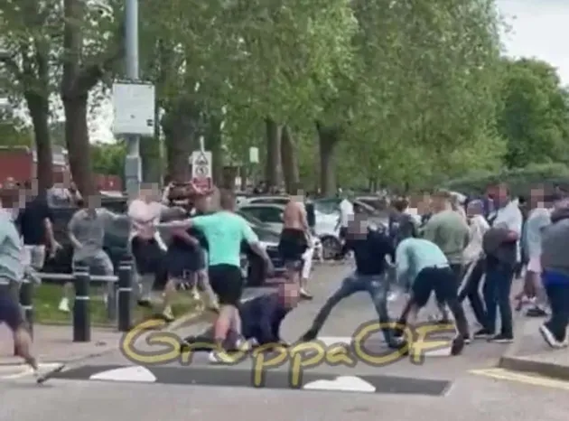 Shocking moment thug knocks out man as football fans brawl outside stadium after Leicester vs West Ham game - Bóng Đá