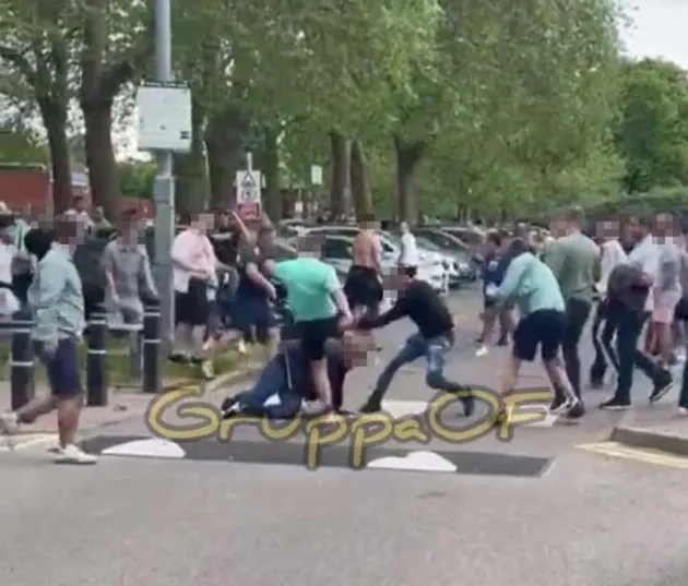 Shocking moment thug knocks out man as football fans brawl outside stadium after Leicester vs West Ham game - Bóng Đá