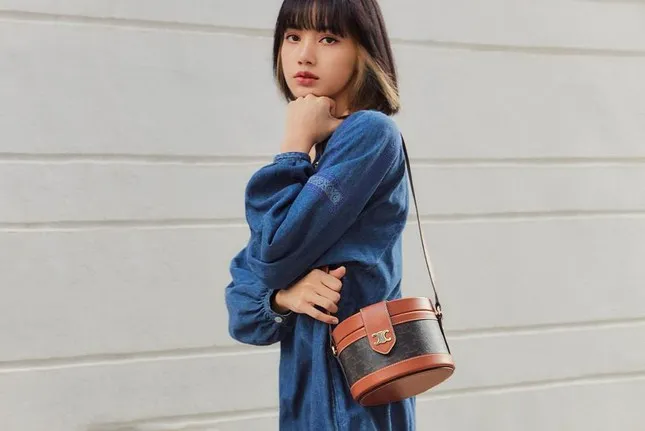 1648178471-https-hypebeast-com-wp-content-blogs-dir-6-files-2020-11-celine-tambour-bag-lisa-blackpink-0-4533-width645height431