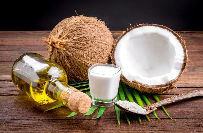 coconuts-oil-and-milk-on-black-background