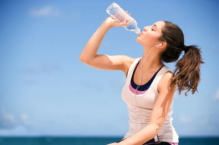 girl-drinking-bottled-water-143018474