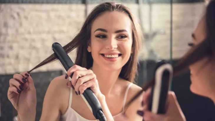 heat-styling-flat-iron-hair-shutterstock-810x456